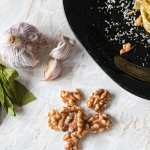 Fresh Garlic Beside Walnuts